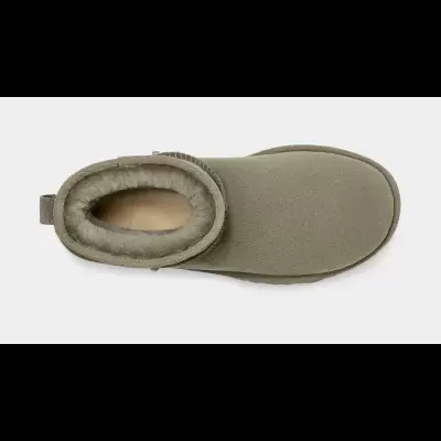 Pantufa verde-oliva forrada a pele sintética vista de cima