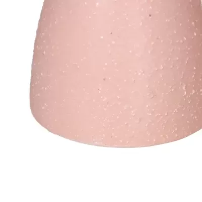 Base rosa claro com textura pontilhada em cerâmica ou porcelana