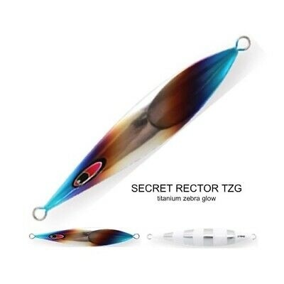 Isca de pesca metálica azul, castanha e branca com texto Secret Rector TZG