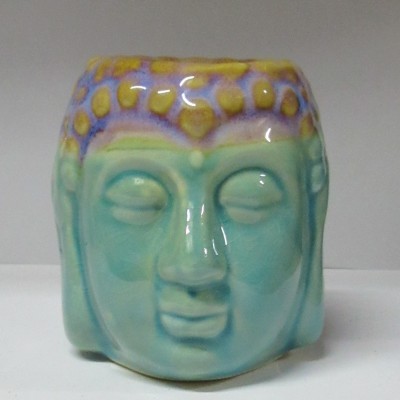 Vaso cerâmico formato cabeça de Buda verde água com detalhes roxos e amarelos