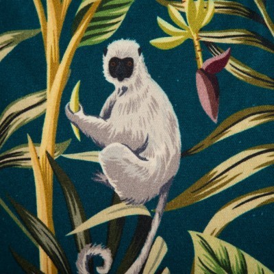 Tecido com padrão de lémure em folhas tropicais, fundo azul