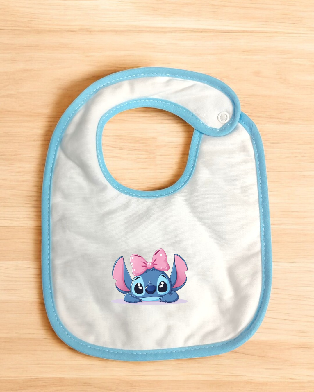 Babete impermeável Stitch com laço - 15 cores à escolha, Exclusivo Pirralhos