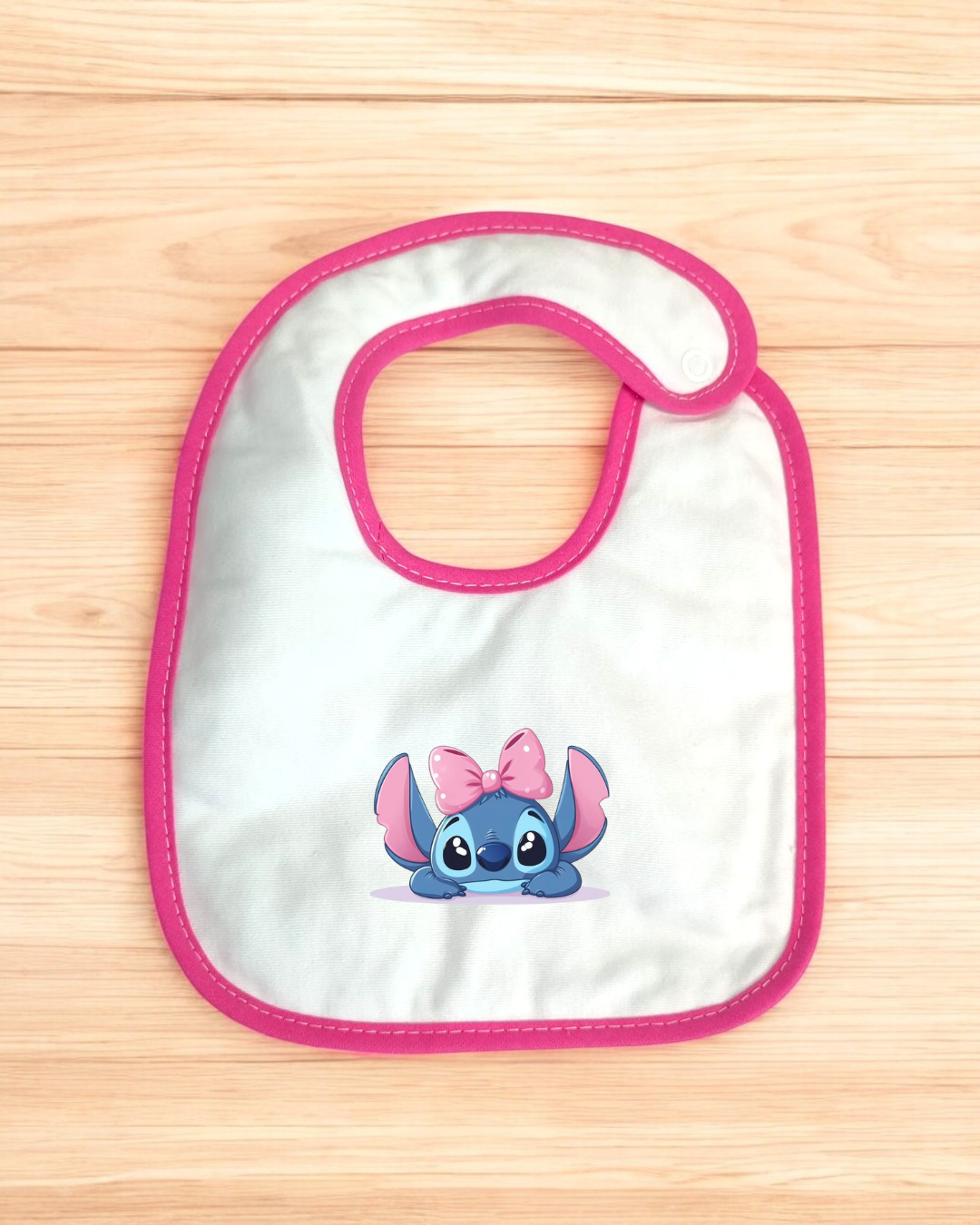 Babete impermeável Stitch com laço - 15 cores à escolha, Exclusivo Pirralhos