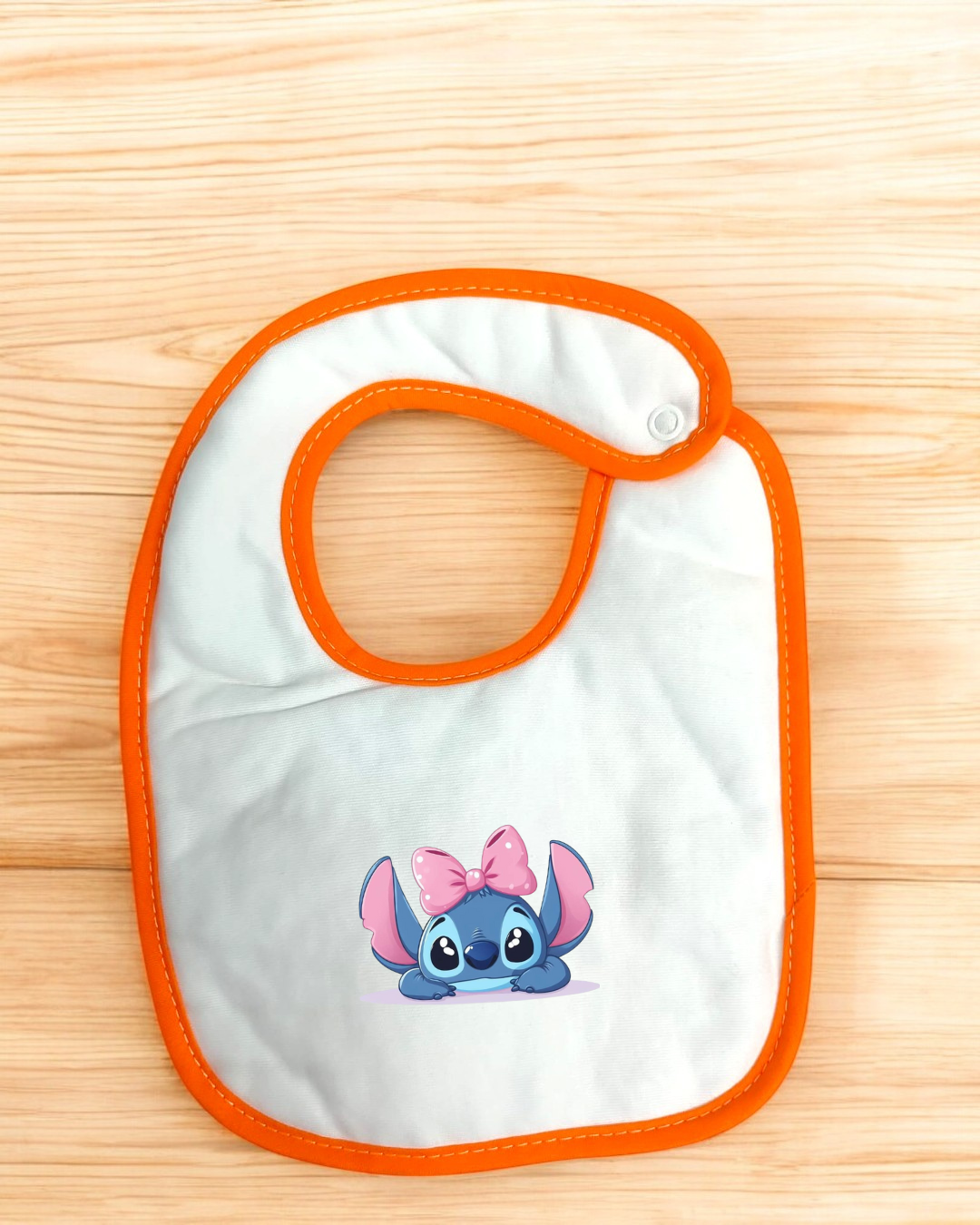 Babete impermeável Stitch com laço - 15 cores à escolha, Exclusivo Pirralhos