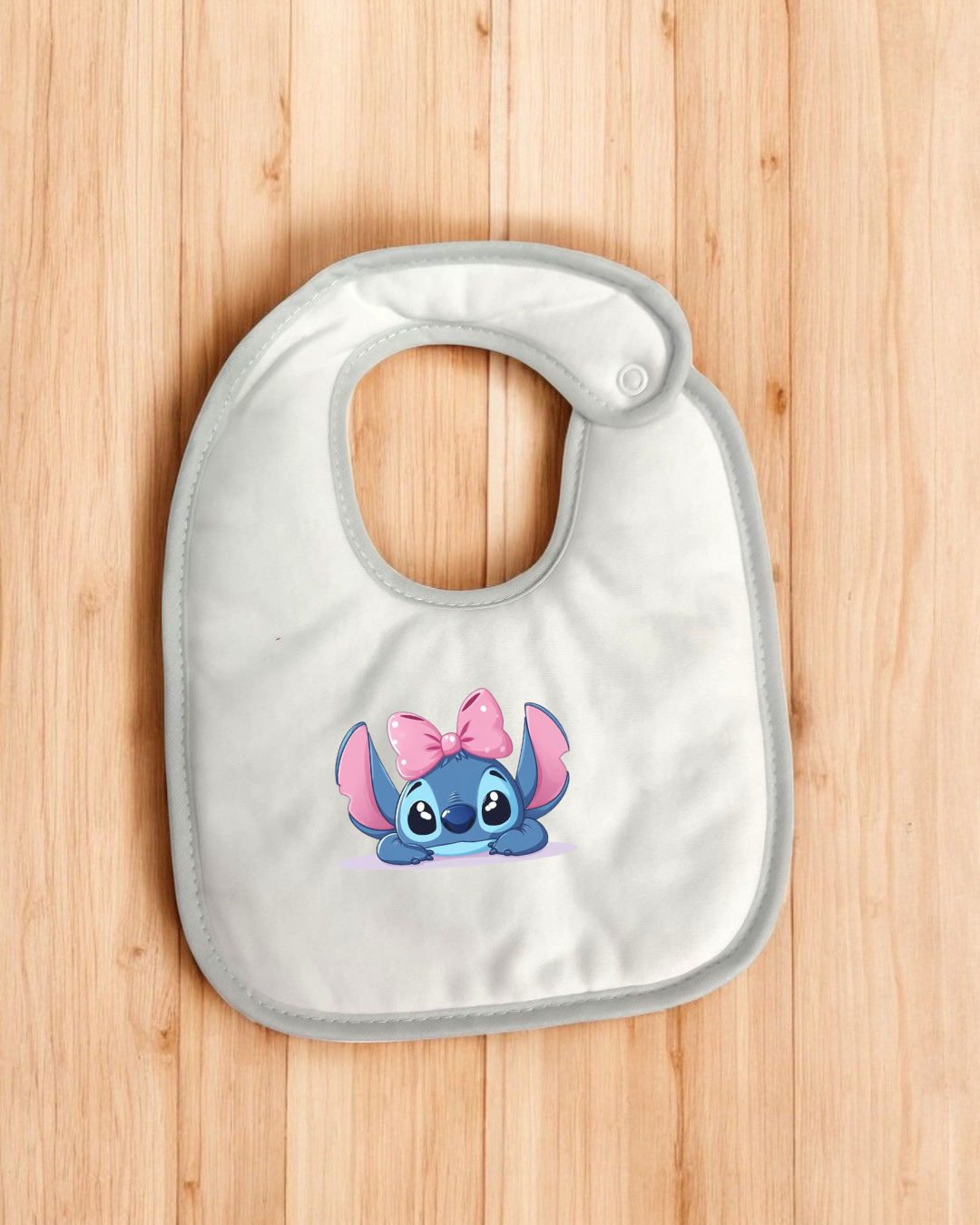 Babete impermeável Stitch com laço - 15 cores à escolha, Exclusivo Pirralhos