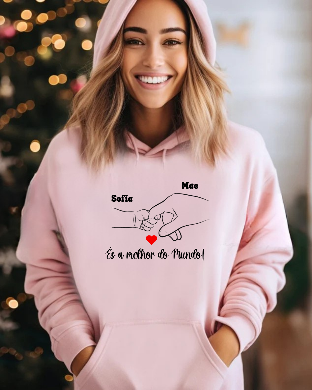 Sweatshirt rosa com desenho de mãos, coração vermelho e texto em preto