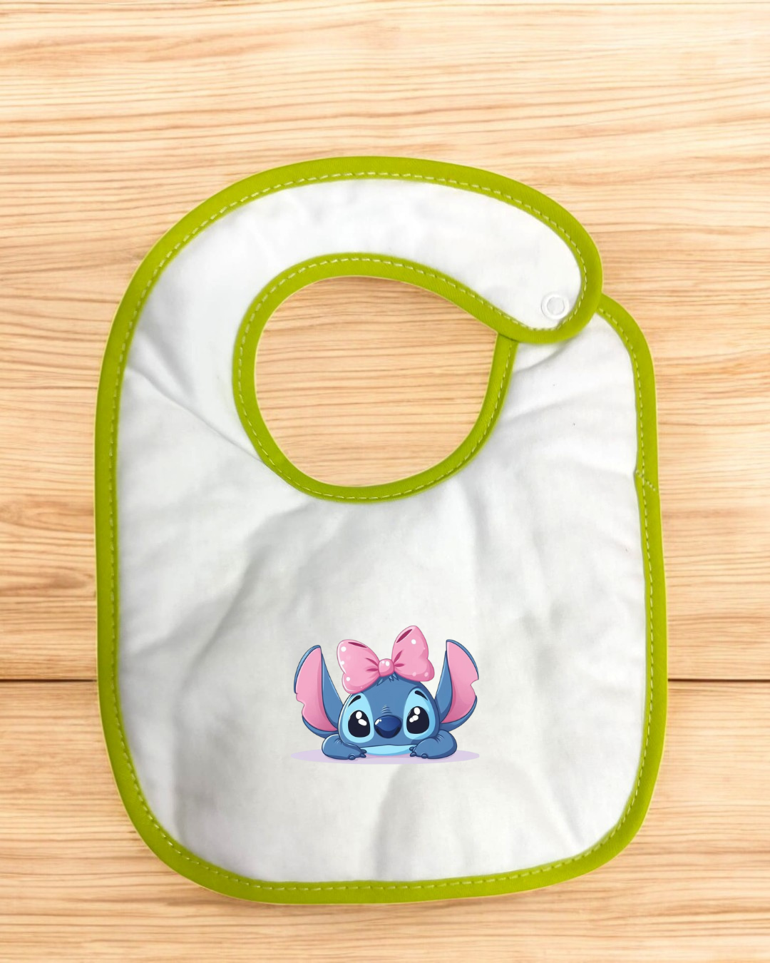 Babete impermeável Stitch com laço - 15 cores à escolha, Exclusivo Pirralhos