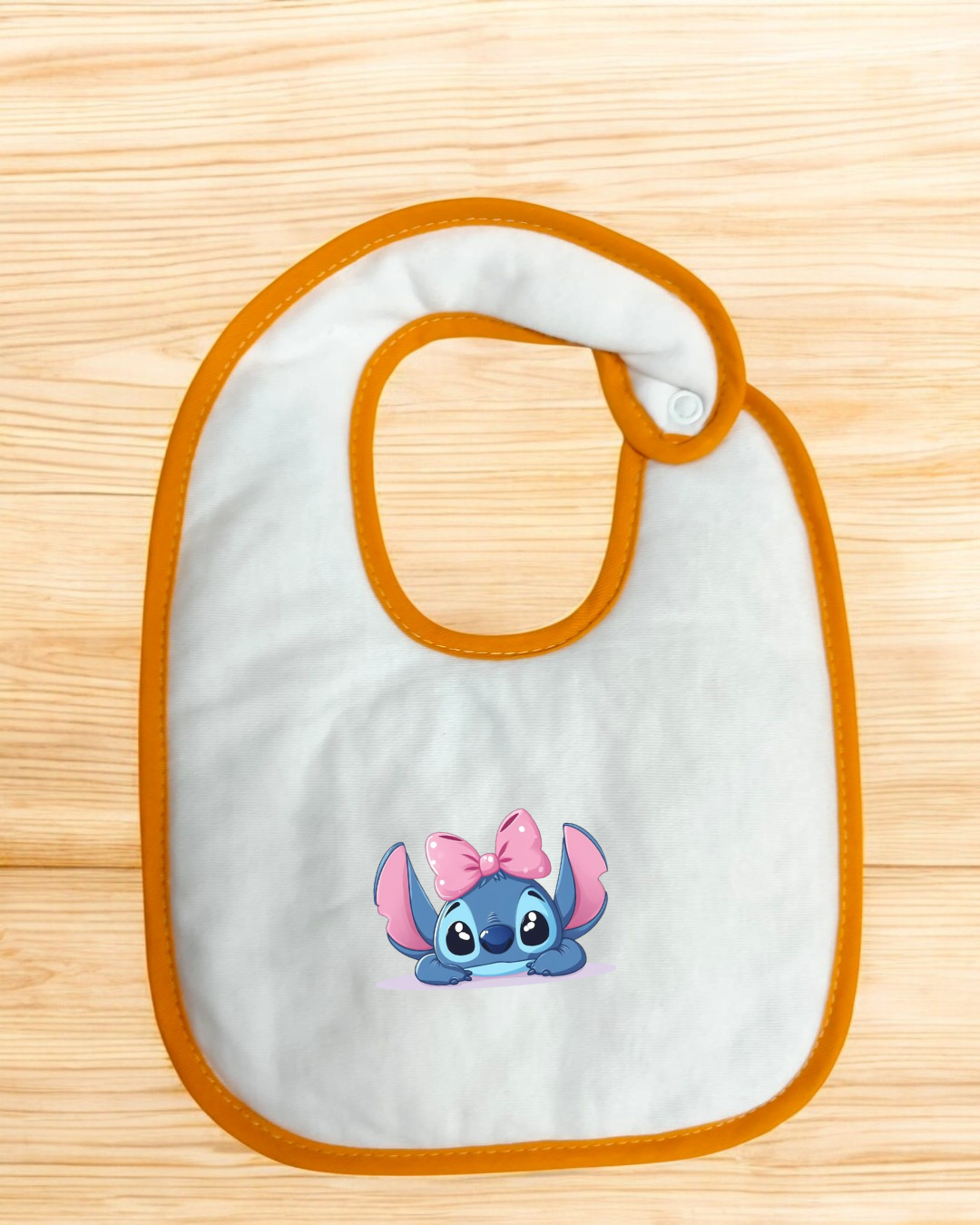 Babete impermeável Stitch com laço - 15 cores à escolha, Exclusivo Pirralhos