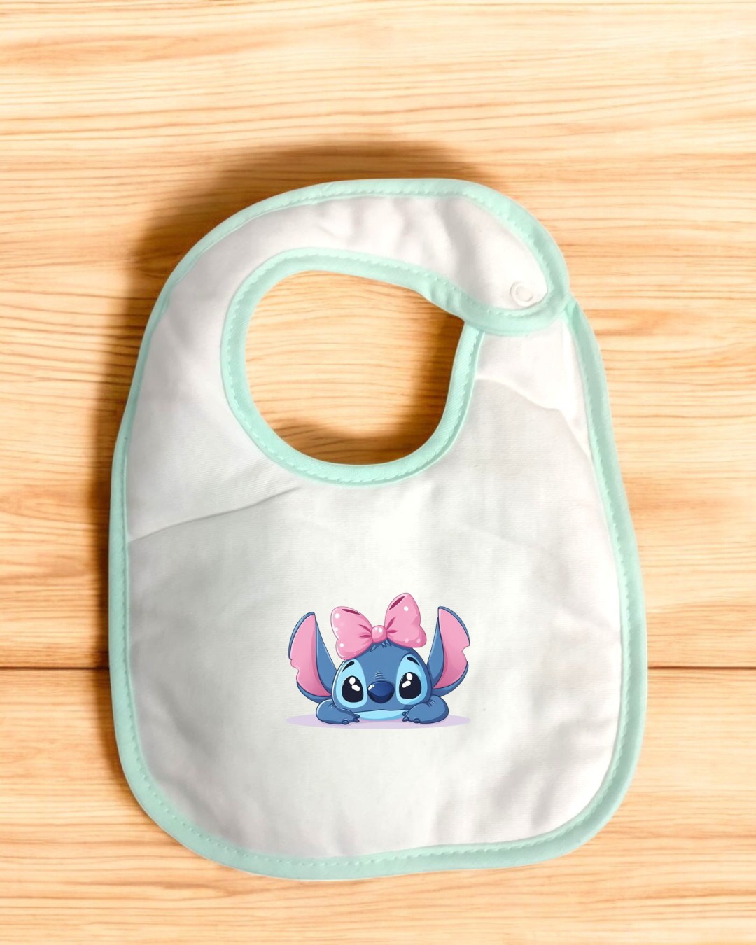 Babete impermeável Stitch com laço - 15 cores à escolha, Exclusivo Pirralhos