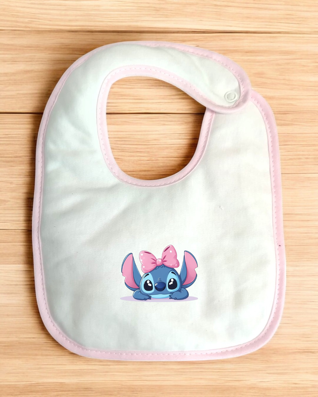 Babete impermeável Stitch com laço - 15 cores à escolha, Exclusivo Pirralhos