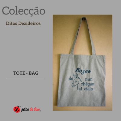 Tote bag cinzento claro com serigrafia azul de burro e texto em galego