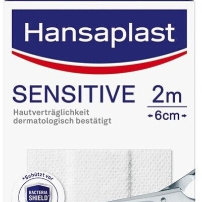 Embalagem Hansaplast Sensitive 2m com tesoura cortando faixa branca