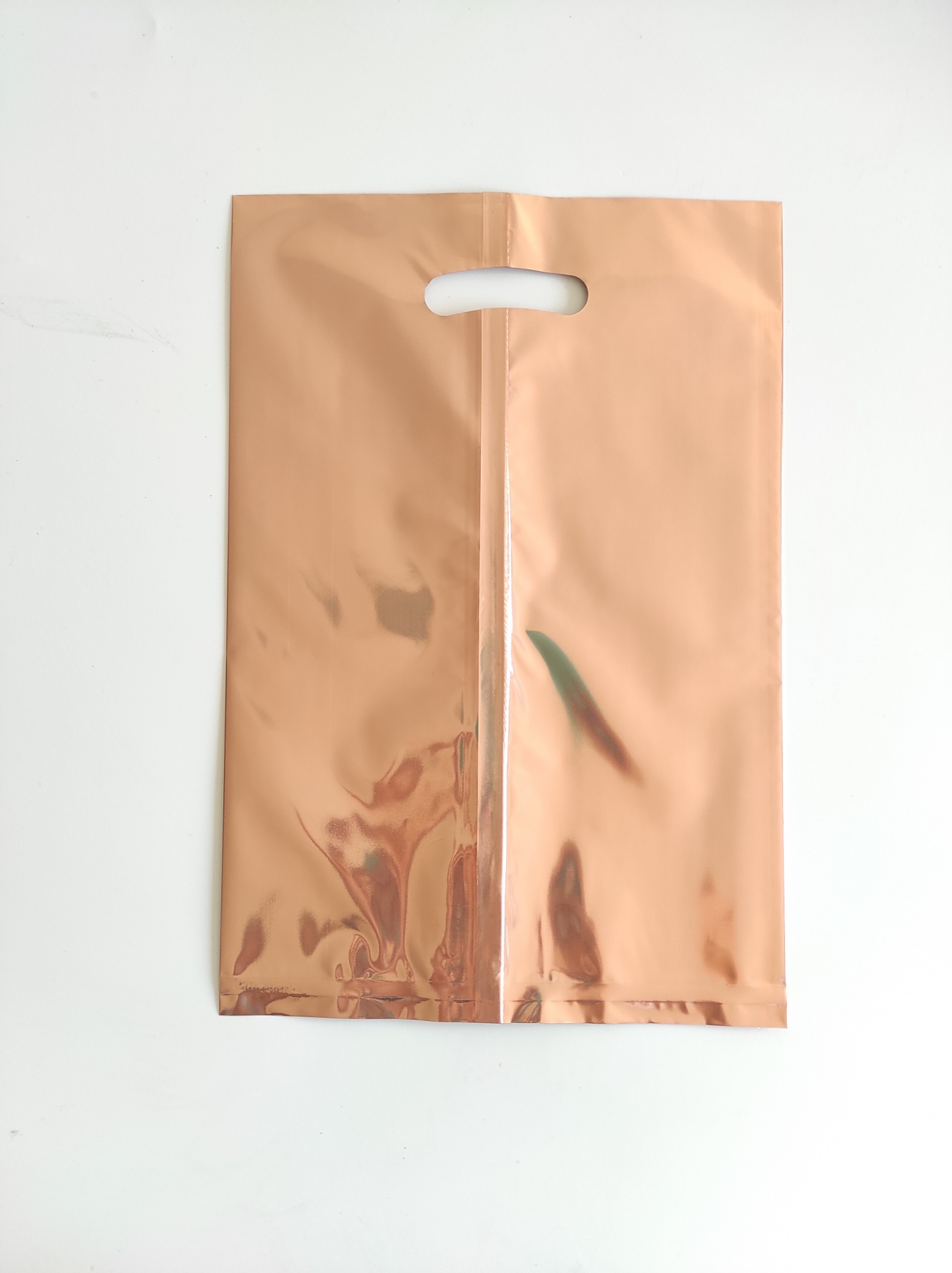 Sacos metalizados rose gold