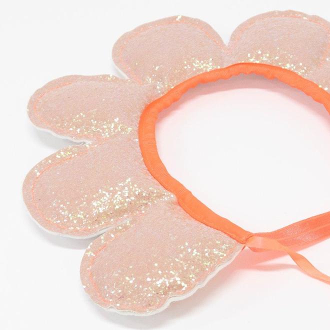 Aro para cabeça rosa com brilho e detalhe laranja em forma de flor