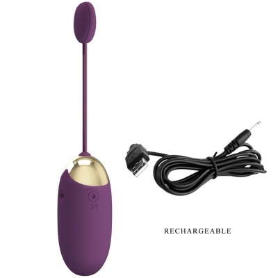 Dispositivo eletrônico roxo com acabado dourado e cabo USB preto ao lado
