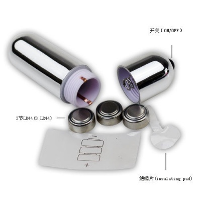 Vibrador metálico desmontado com pilhas LR44 e instruções em chinês