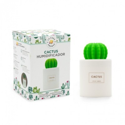 Humidificador branco com topo verde em forma de cacto ao lado da caixa decorada com estampas de cactos.