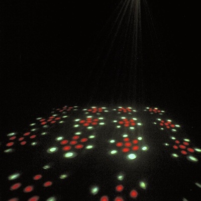 Luz de efeito LED com padrões florais vermelhos e verdes no chão