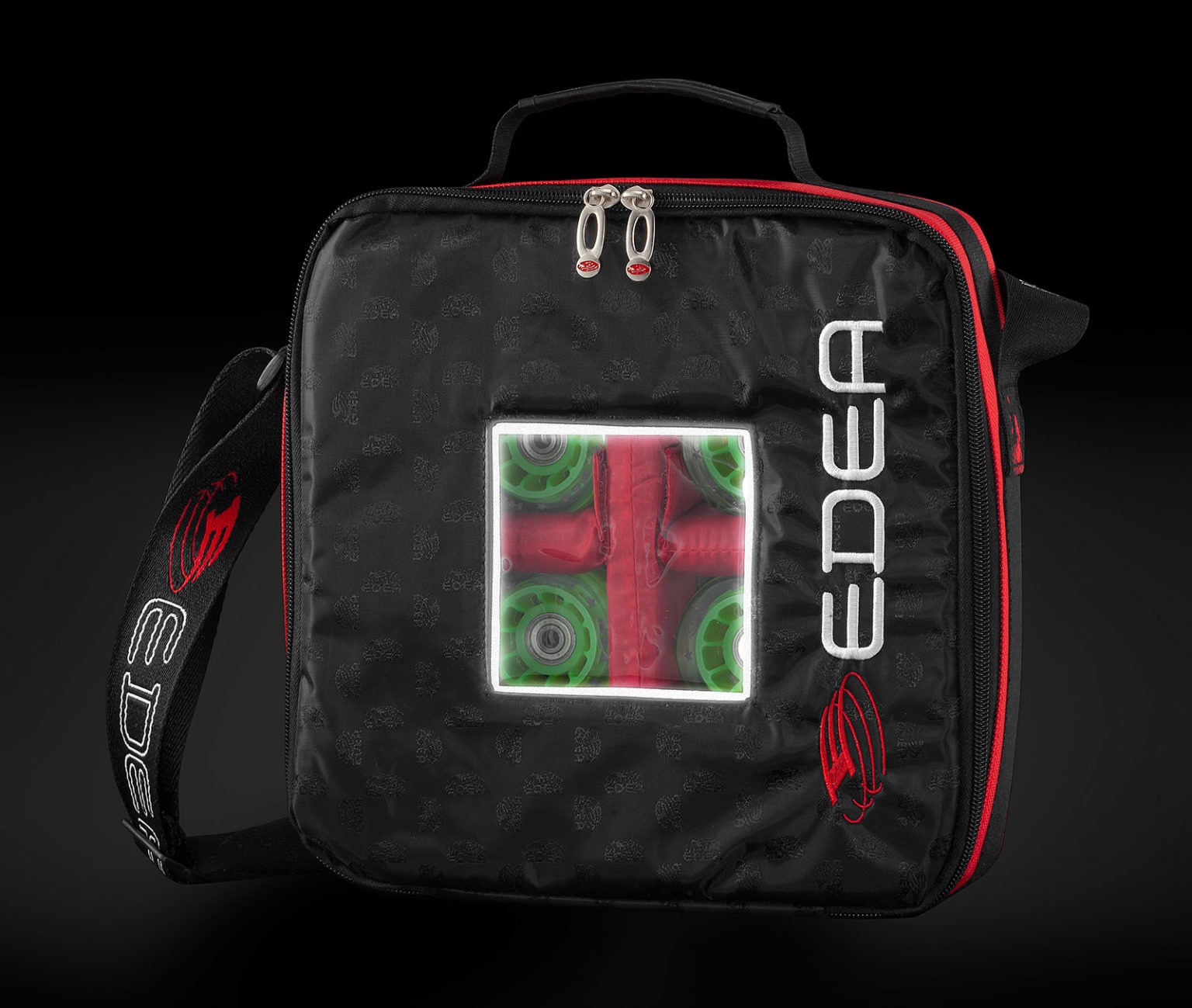 Mala preta com janela transparente mostrando rolamentos verdes e vermelhos, com texto e logotipo CEDER.