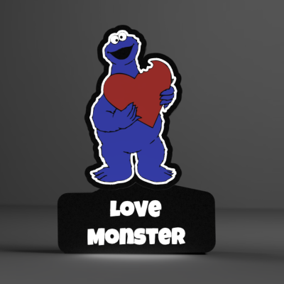 Figura azul segurando coração vermelho com texto LOVE MONSTER em base preta