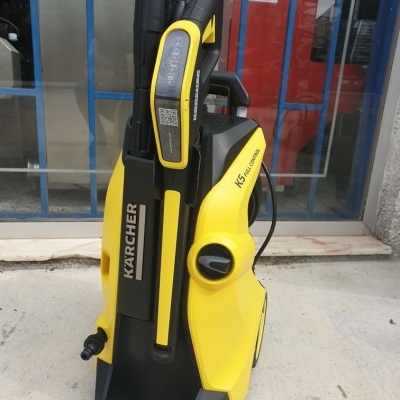 Máquina de lavar alta pressão Karcher KS Control amarelo e preto com rodas e mangueira enrolada