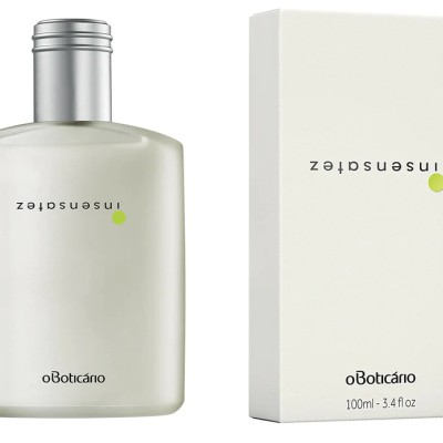 frasco de vidro fosco com tampa prateada ao lado de caixa branca com texto