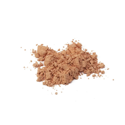 Pó compacto bege claro espalhado