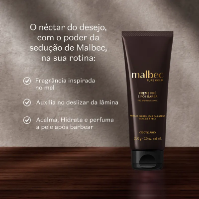 Tubo de creme pós-barba Malbec Pure Gold castanho escuro com letras douradas em superfície de madeira