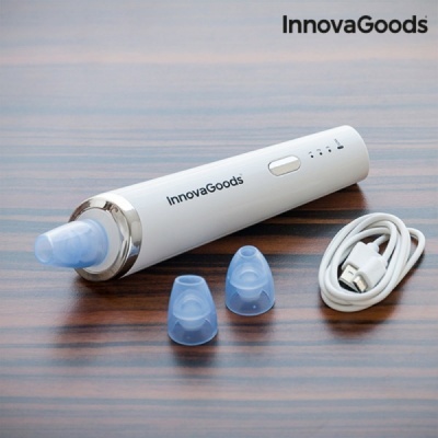 Dispositivo InnovaGoods branco com adaptadores azuis e cabo USB sobre mesa de madeira