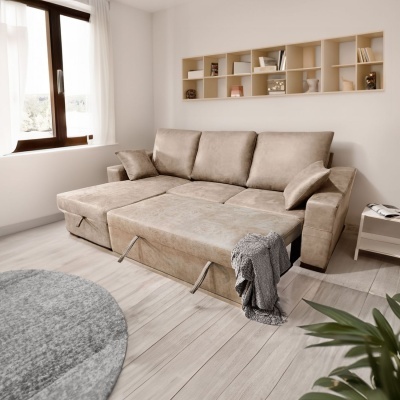 sofá-cama bege em tecido camurça estendido numa sala