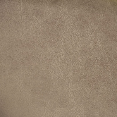 Superfície bege-acinzentada com textura rugosa que imita couro