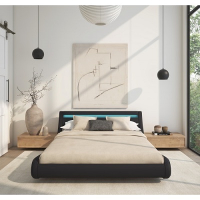 Quarto moderno com cama preta, roupa de cama bege e decoração minimalista