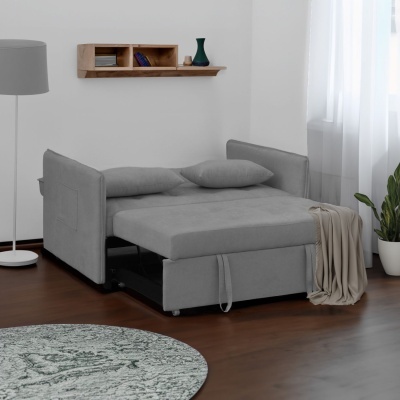 Sofá-cama cinzento em sala com decoração minimalista