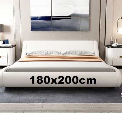 Cama estofada branca com tamanho 180x200cm e decoração minimalista