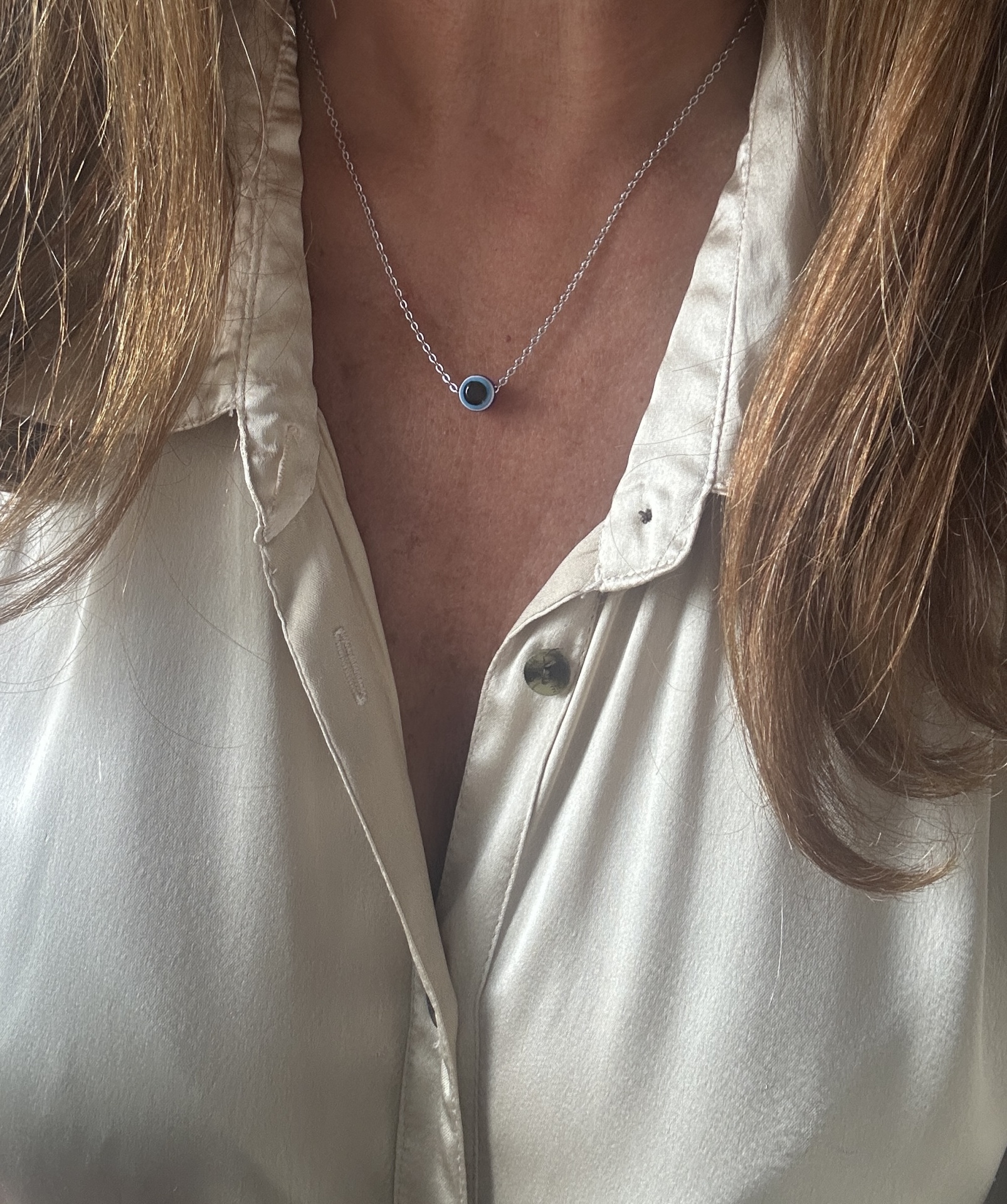 Fio Prateado com Olho Grego Azul: Proteção e Elegância num Acessório Único Fio Prateado com Olho Grego Azul: Proteção e Elegância num Acessório Único