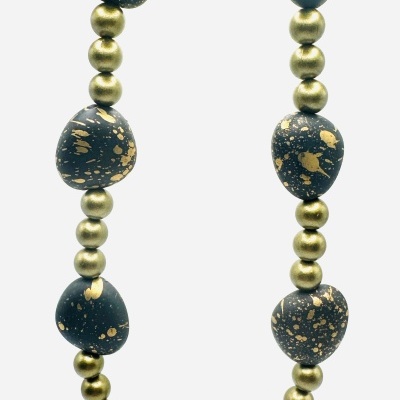 ✨ Colar Preto Dourado – Sofisticação e Exclusividade ✨