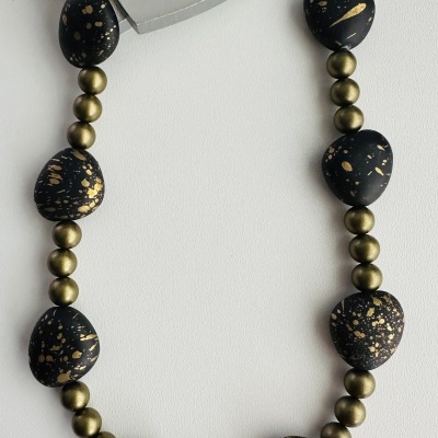 ✨ Colar Preto Dourado – Sofisticação e Exclusividade ✨