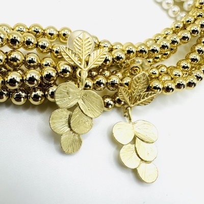 Brinco Folhas Douradas em Design Texturizado