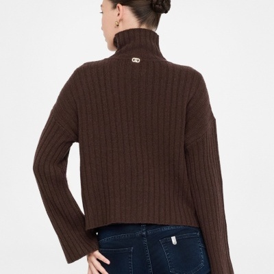 Wool polo-neck with bejewelled buttons