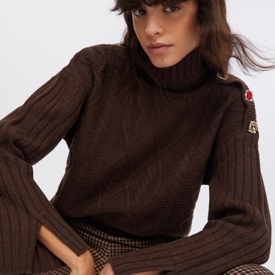 Wool polo-neck with bejewelled buttons