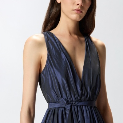 Dress with bow and loose skirt