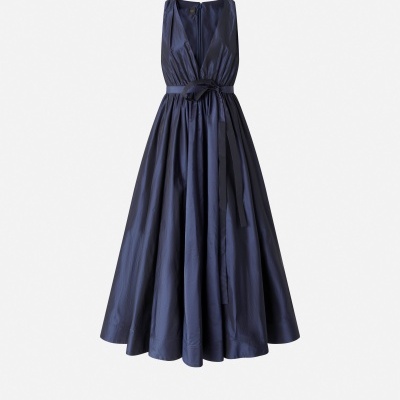 Dress with bow and loose skirt