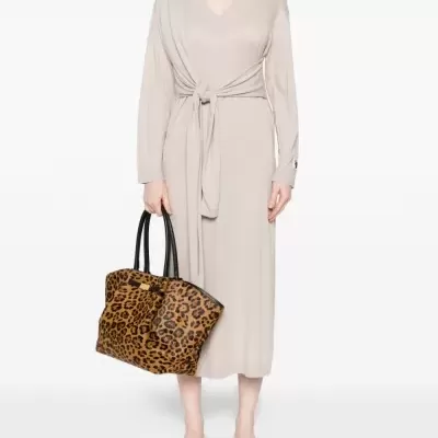 Beige knit midi dress with knot detail Beige knit midi dress with knot detail