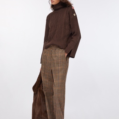 Wool polo-neck with bejewelled buttons