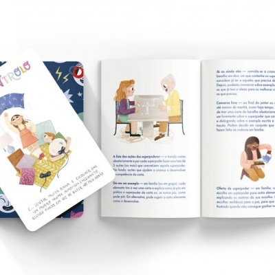 Cartas e livro ilustrado aberto com texto em português