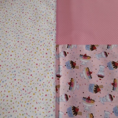 Três tecidos com padrões diferentes: confetes coloridos, pontos brancos em rosa, bolos desenhados em fundo rosa.