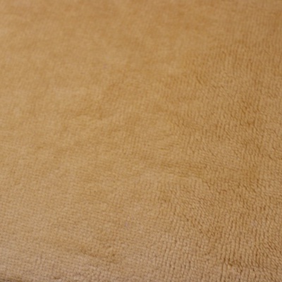 Tecido bege claro com textura de microfibra