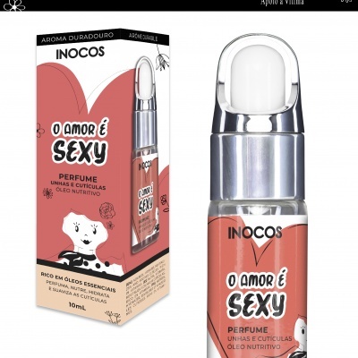 Perfume para unhas e cutículas INOCOS O AMOR É SEXY com frasco transparente e tampa prateada ao lado da respectiva caixa rosa