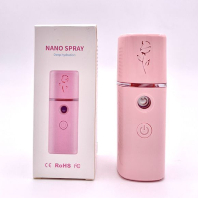 Nano Spray rosa com botão e caixa com texto e símbolos
