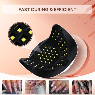 Dispositivo LED para cura de unhas preto com luzes amarelas e unhas decoradas em fundo cor-de-rosa